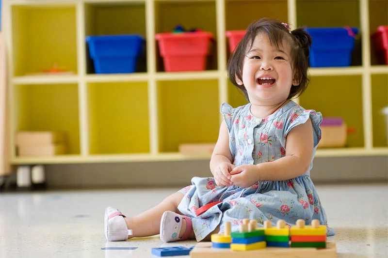 Smiling toddler with clearly visible mouth and face